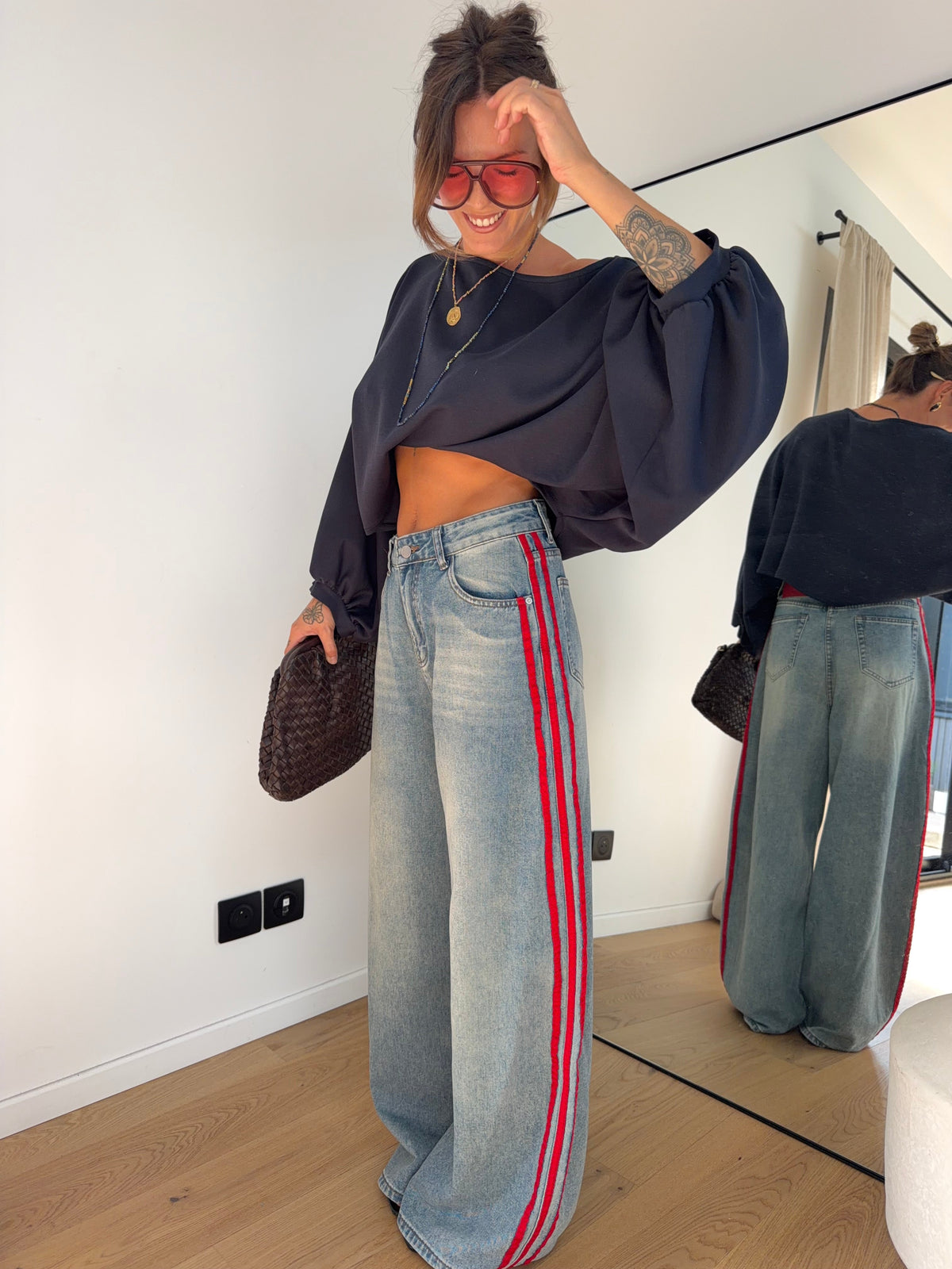 Jeans à bandes rouges