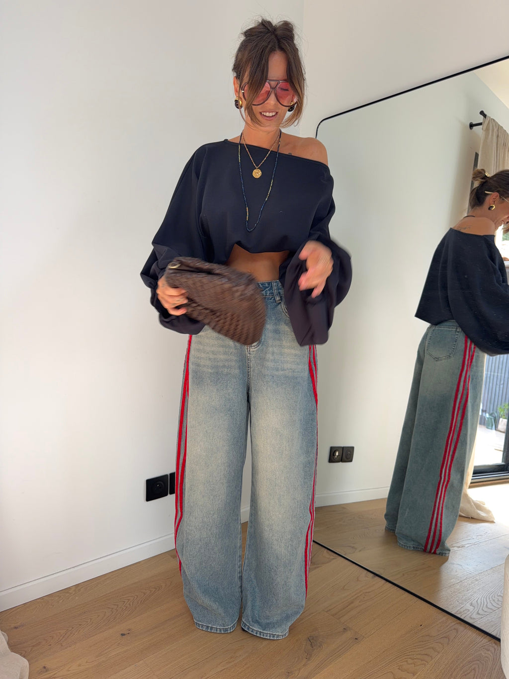 Jeans à bandes rouges