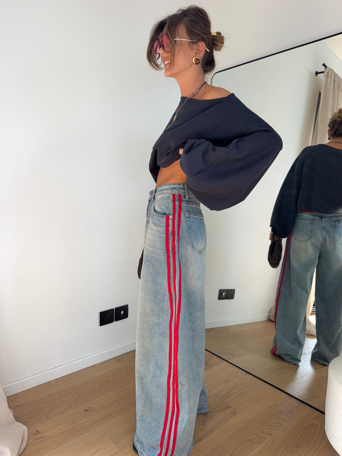 Jeans à bandes rouges