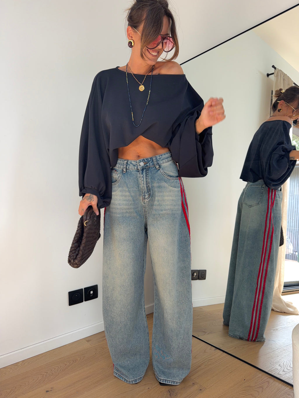 Jeans à bandes rouges